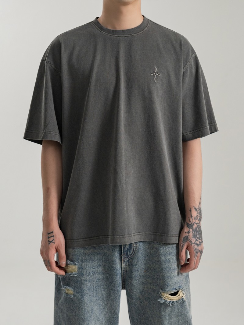 HEAVYWEIGHT TEE in FADED GRAPHITE, first production run — Worn · male torso (studio, September 2026)