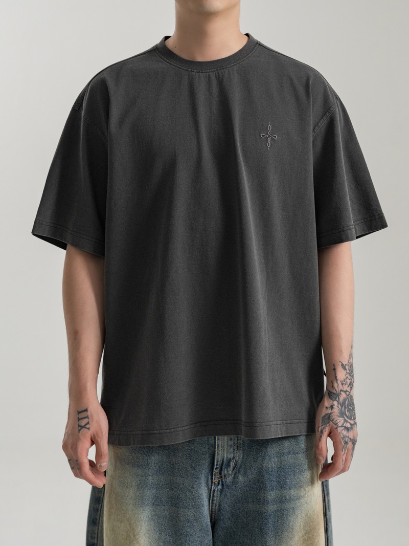 HEAVYWEIGHT TEE in WASHED CHARCOAL, first production run — Worn · male torso (studio, September 2026)