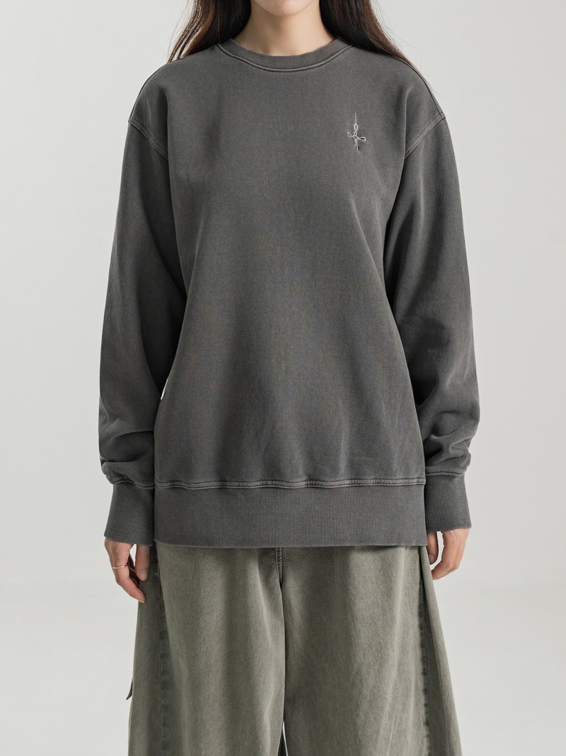 PIGMENT FADE SWEATSHIRT in FADED GRAPHITE, first production run — Worn · female torso (studio, September 2026)