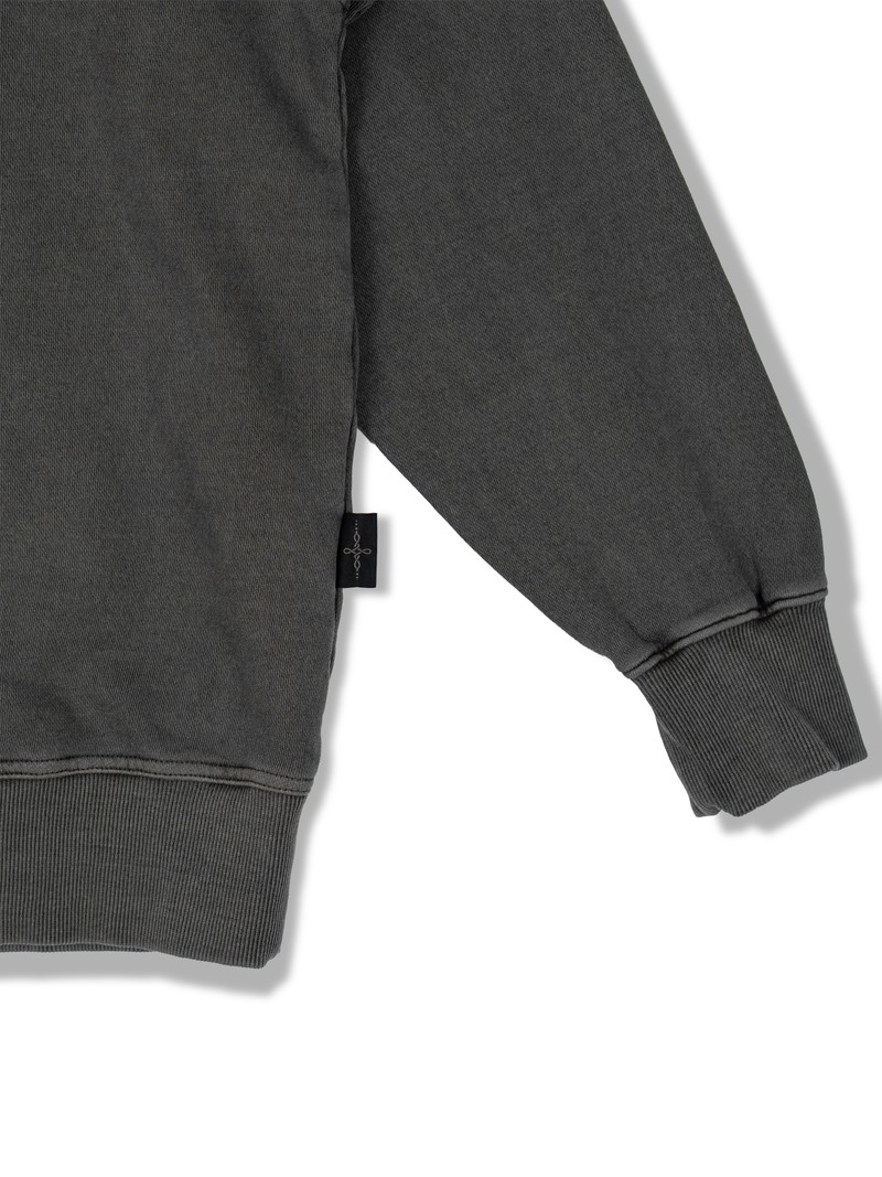 PIGMENT FADE SWEATSHIRT in FADED GRAPHITE, first production run — Side tag (studio, September 2026)