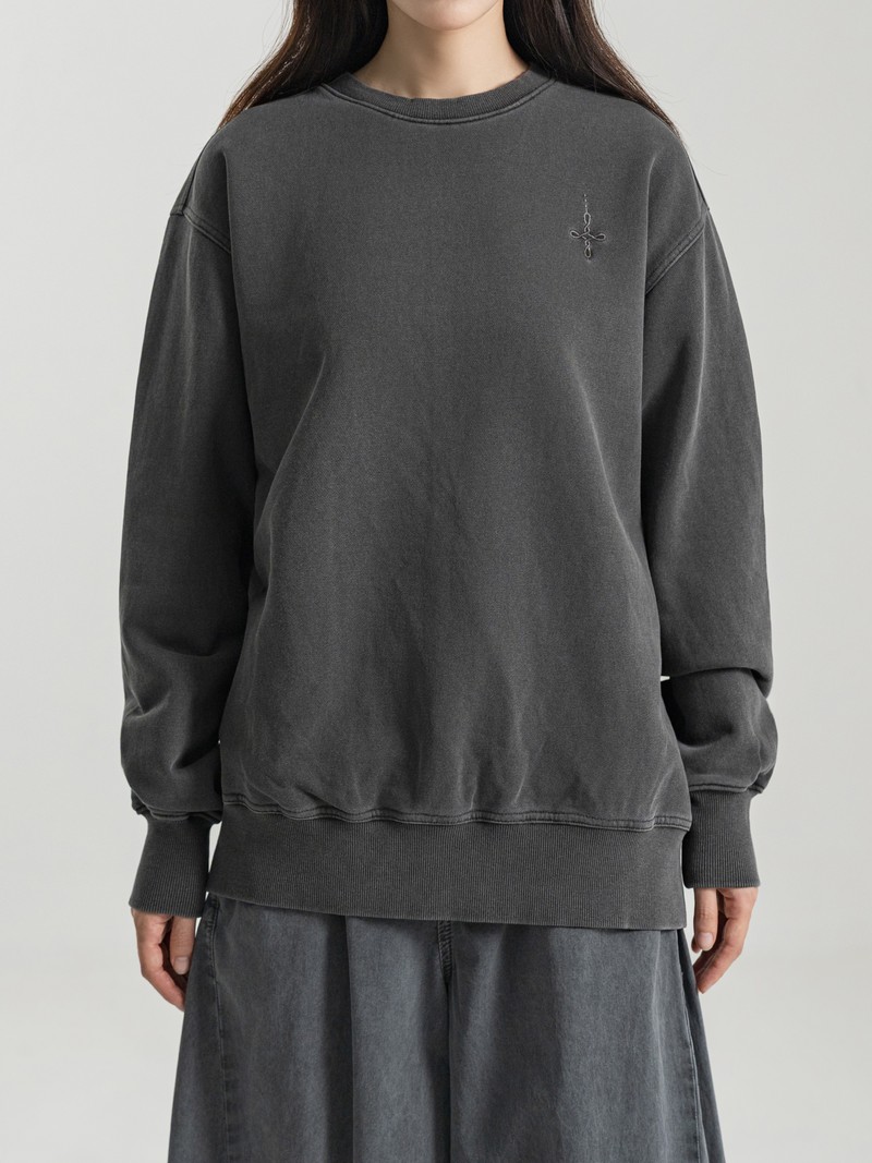 PIGMENT FADE SWEATSHIRT in WASHED CHARCOAL, first production run — Worn · female torso (studio, September 2026)